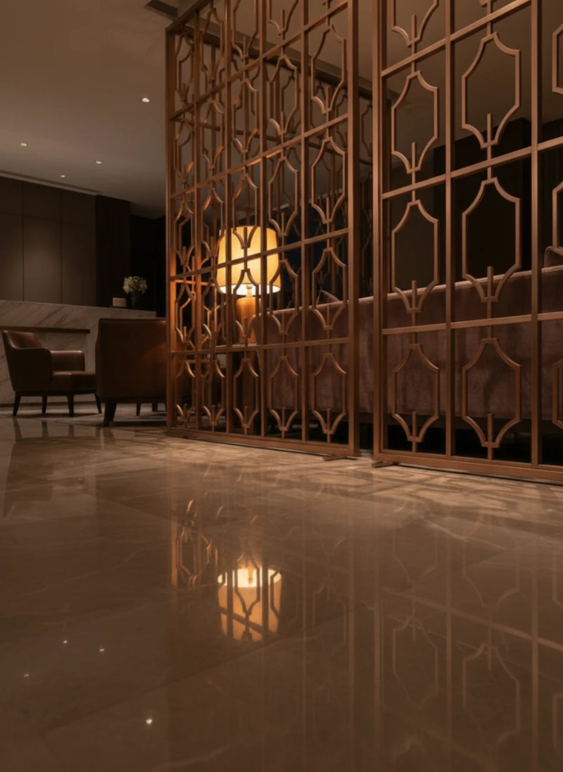 Seamless floor integration of Rose Gold frame into marble flooring.