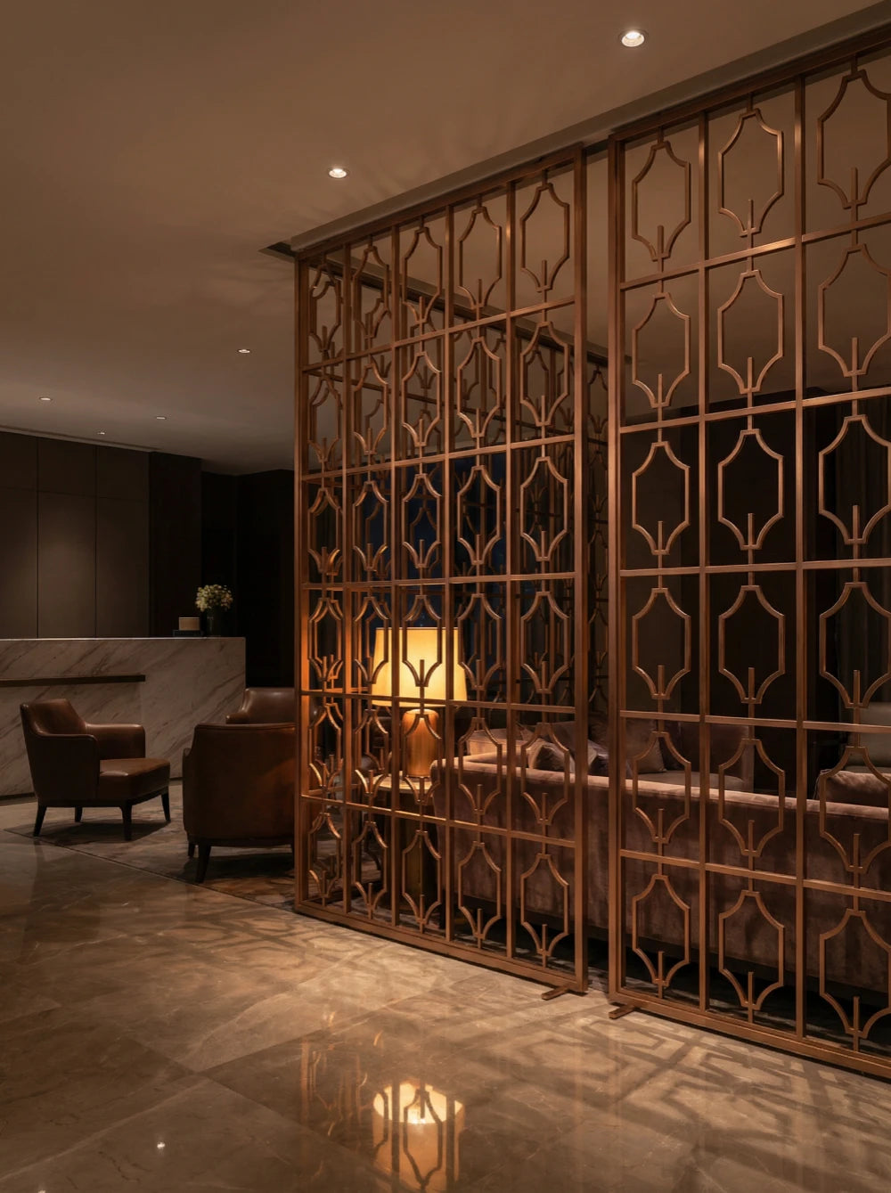 High-end hotel lobby divider screen in Rose Gold stainless steel.