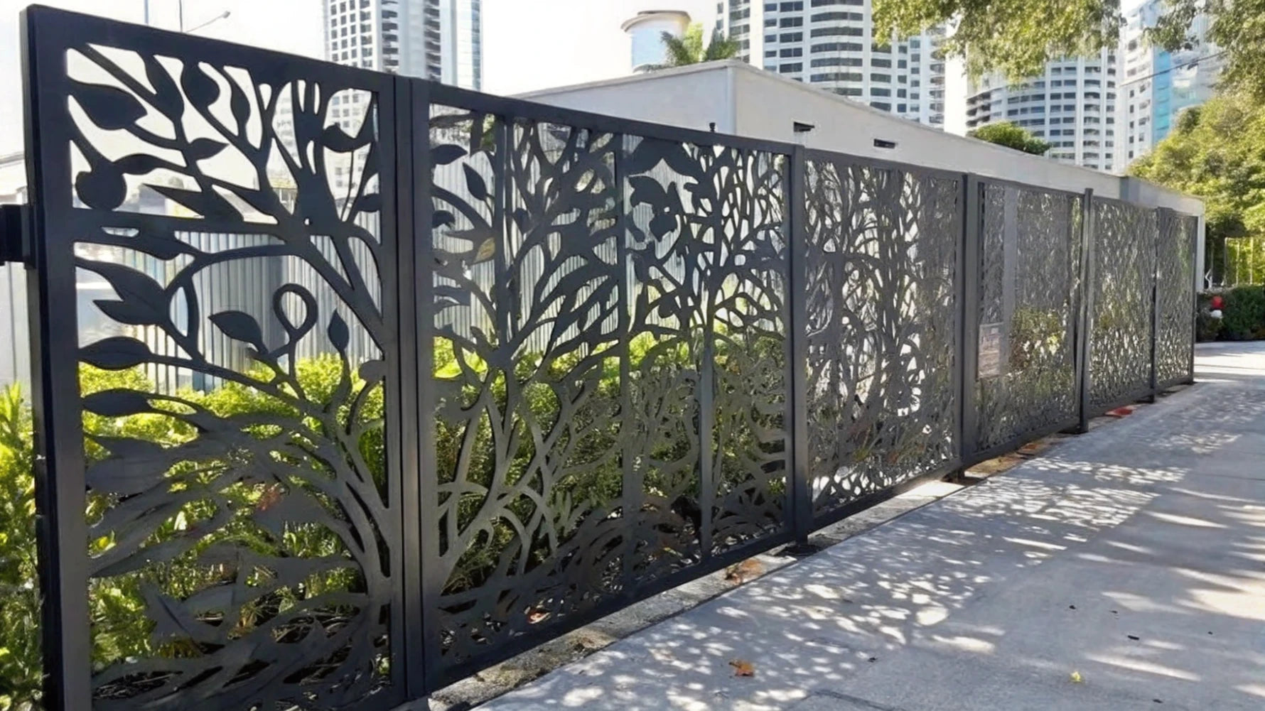 Antique Bronze stainless steel privacy screen installed in a luxury garden patio.