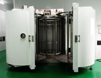 Industrial vacuum PVD coating chamber for architectural gold, rose gold, and bronze finishes.