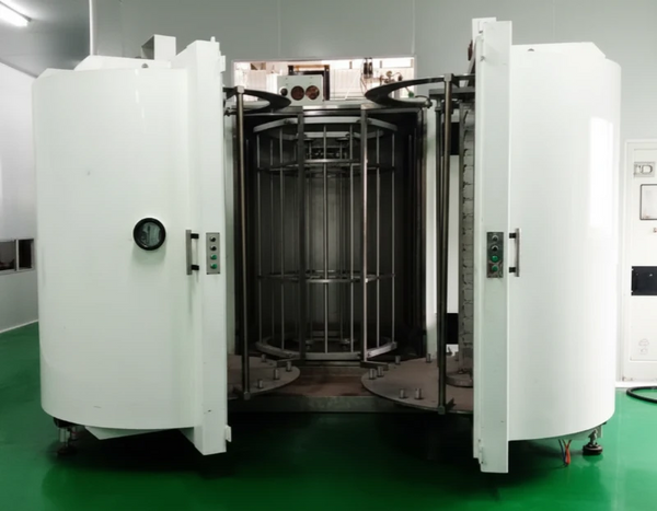 Industrial vacuum PVD coating chamber for architectural gold, rose gold, and bronze finishes.