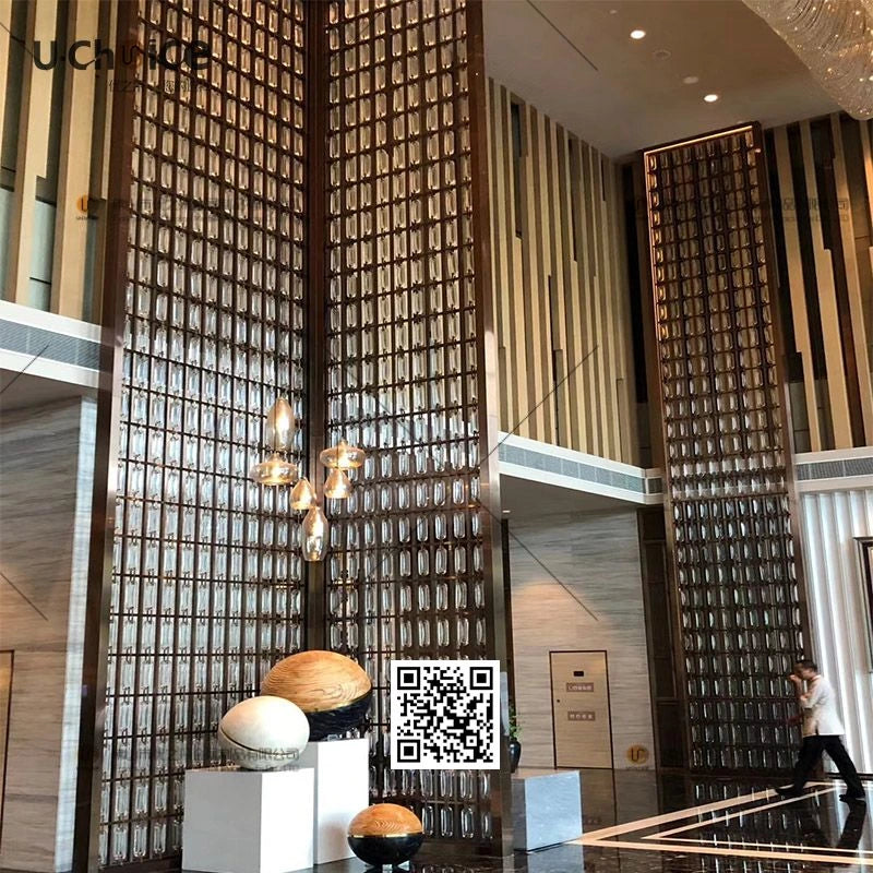 Our CNC laser-cut stainless steel geometric screen used in a premium interior.