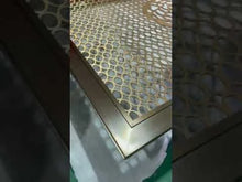Close-up of our laser-cut stainless divider detail.